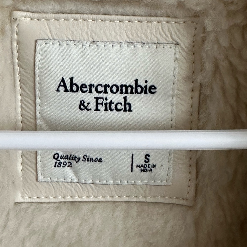 Size Small cream colored Abercrombie leather jacket.